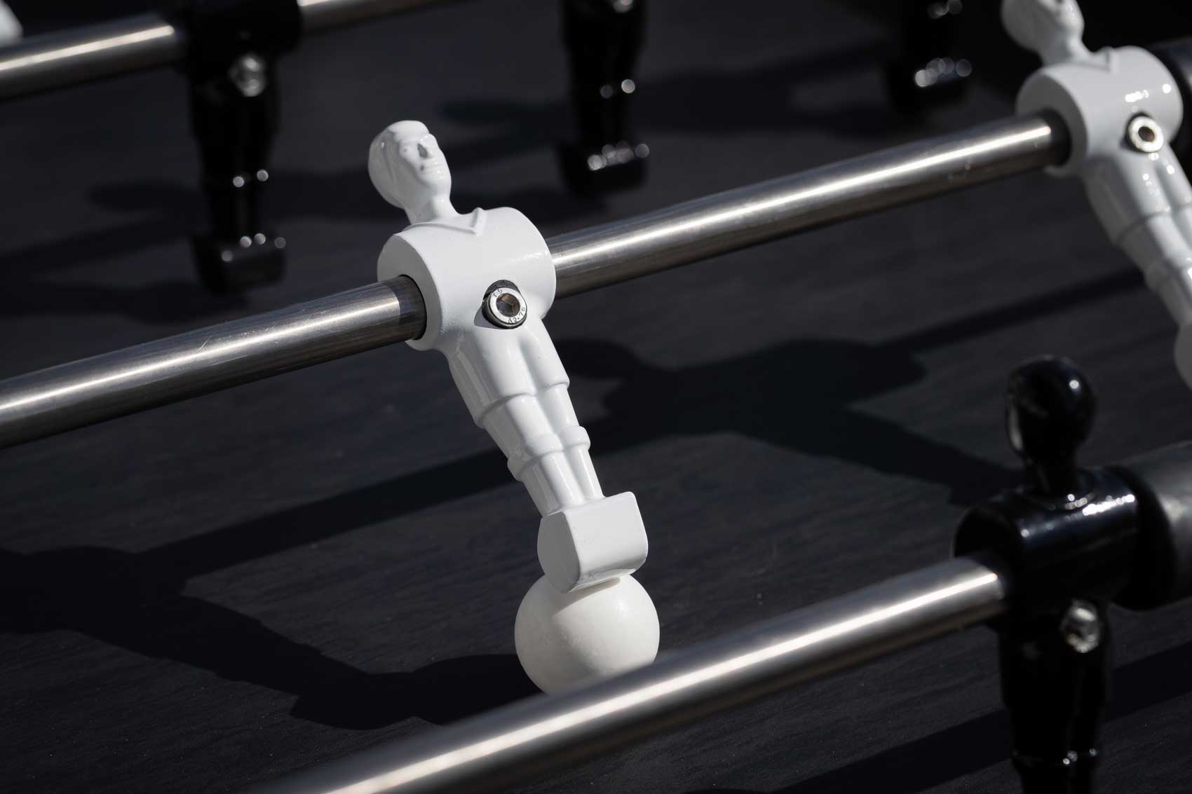 joueur babyfoot blanc et balle blanche règles cornilleau